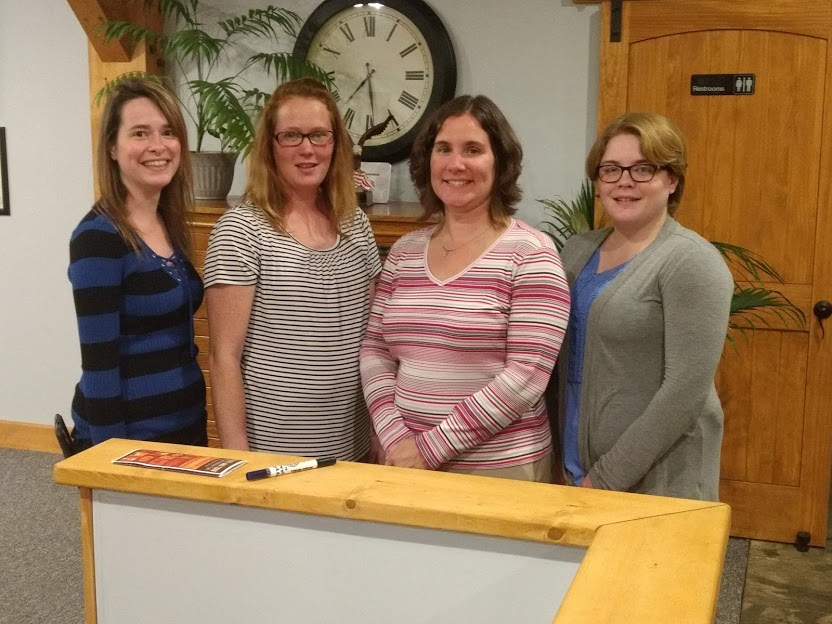 A portion of our professional staff. Photo of Sidle Insurance Staff
